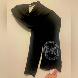 Michael Kors Charcoal gray knitted scarf with metal embellished “MK”, 82”,NWOT